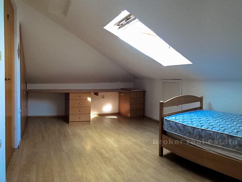 Two-storey four-bedroom apartment