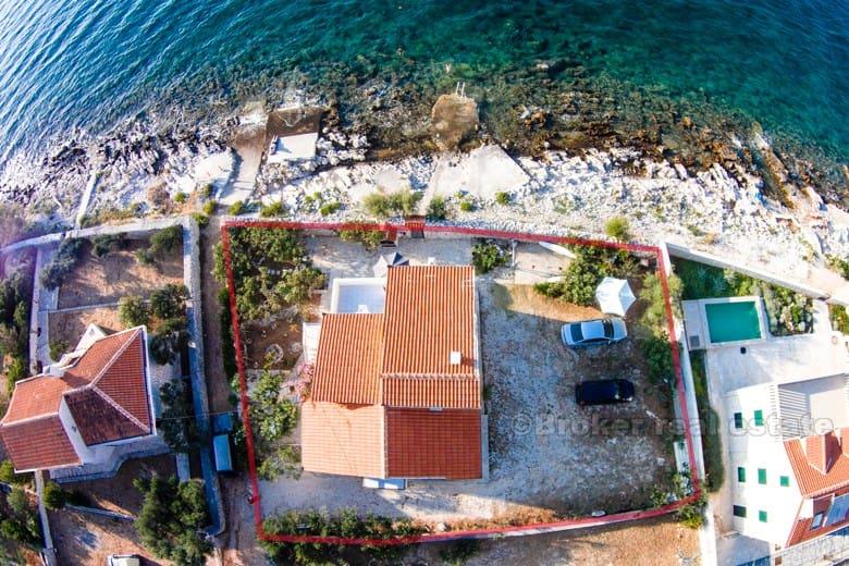 Hus ved strandpromenaden, til salgs