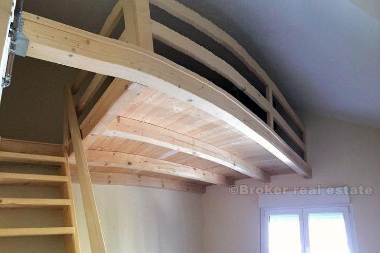 Appartement à deux étages à trois chambres, à vendre