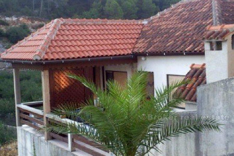 Small house in a quiet bay, for sale