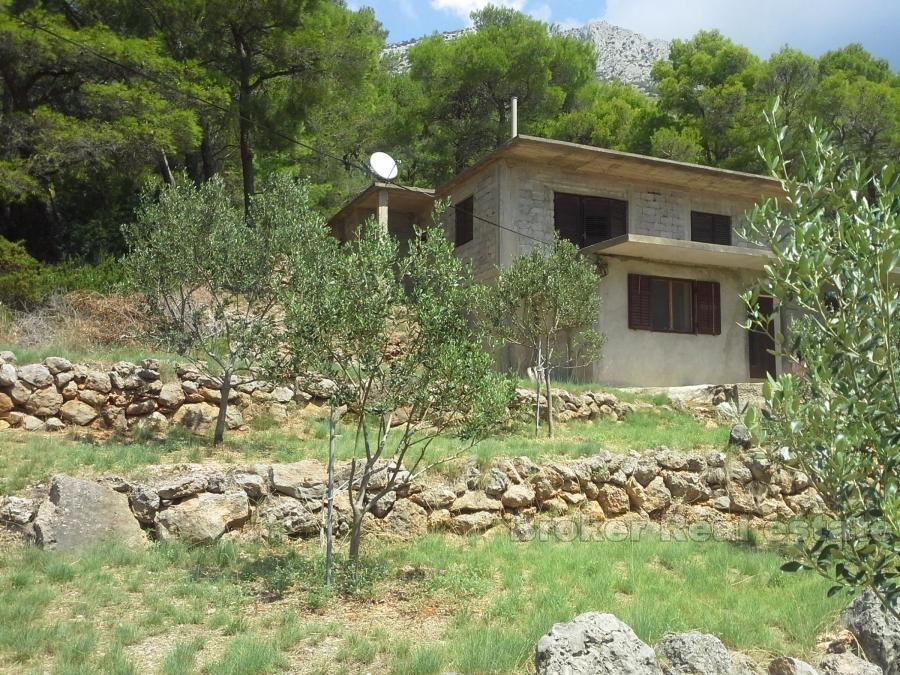 Maison sur un terrain à bâtir avec vue sur la mer
