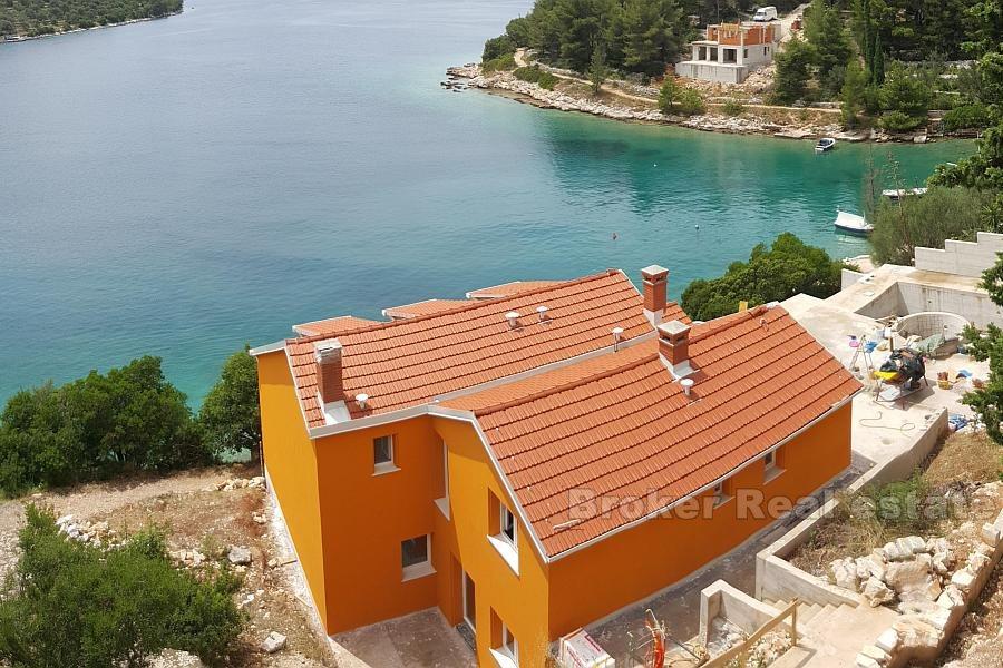 Historical building in a quiet bay, for sale