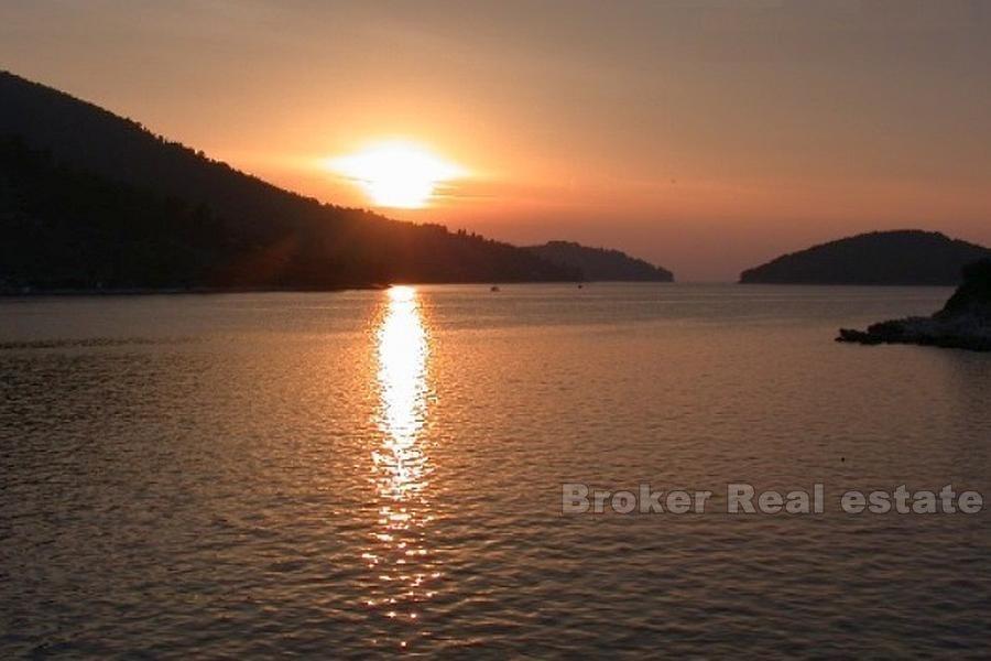 Historical building in a quiet bay, for sale