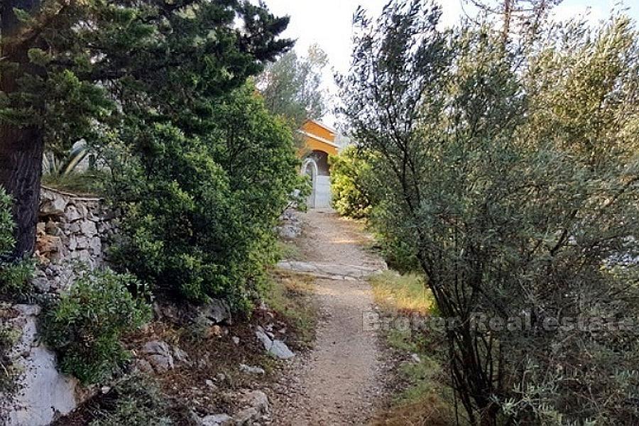 Historical building in a quiet bay, for sale