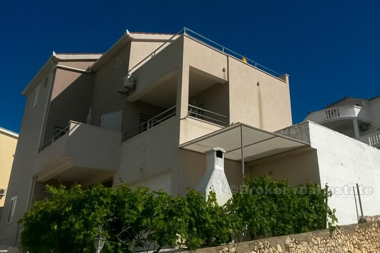 Property consists of two houses that share parking