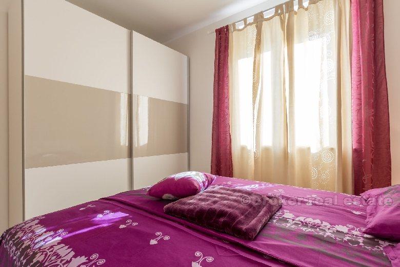 Moderno bilocale al piano terra, in affitto