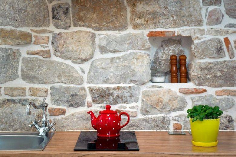 Appartement au centre, situé dans une belle maison en pierre, à vendre