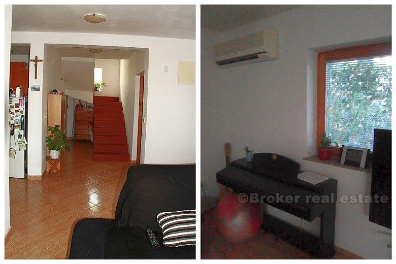 Casa con vista sul mare, circondata da un giardino mediterraneo, in vendita