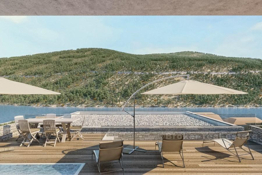 Building land by the sea, for sale.
