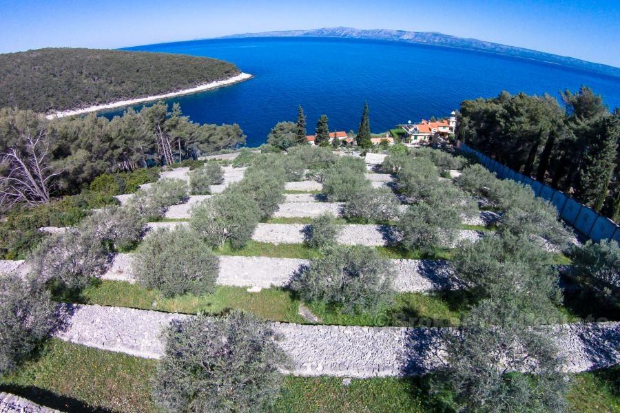 Maison en pierre avec vue sur la mer, à vendre