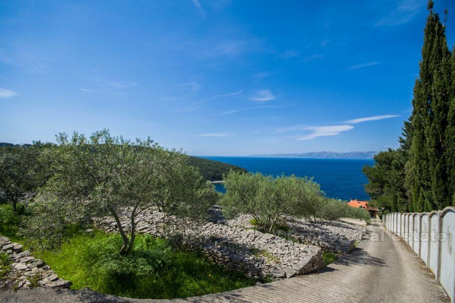 Maison en pierre avec vue sur la mer, à vendre