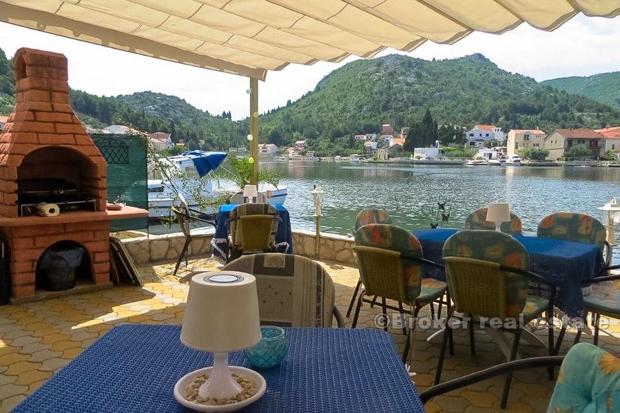 Renovated stone house in the first row to the sea, for sale