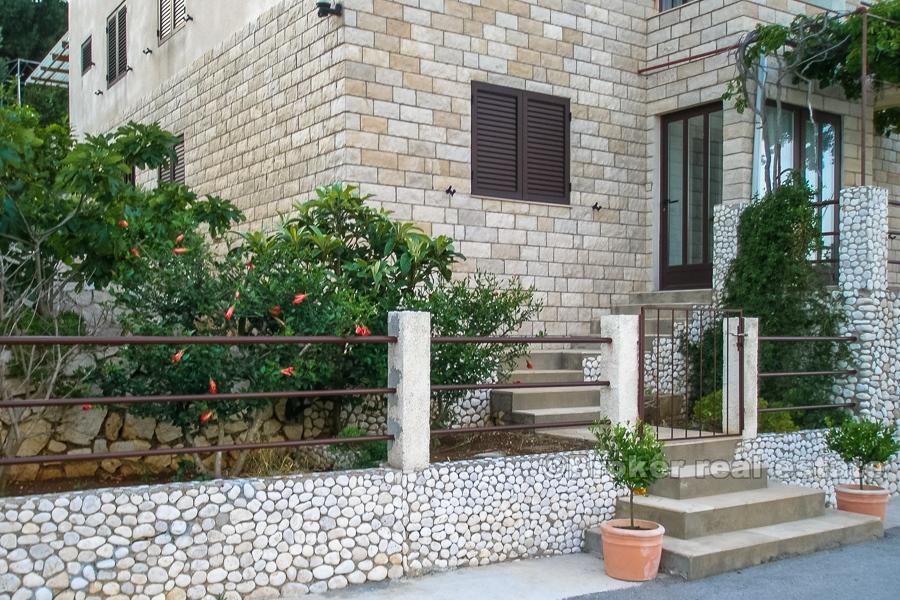 Maison à la mer avec amarre, à vendre