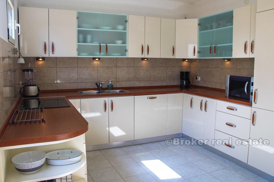 Maison à la mer avec amarre, à vendre