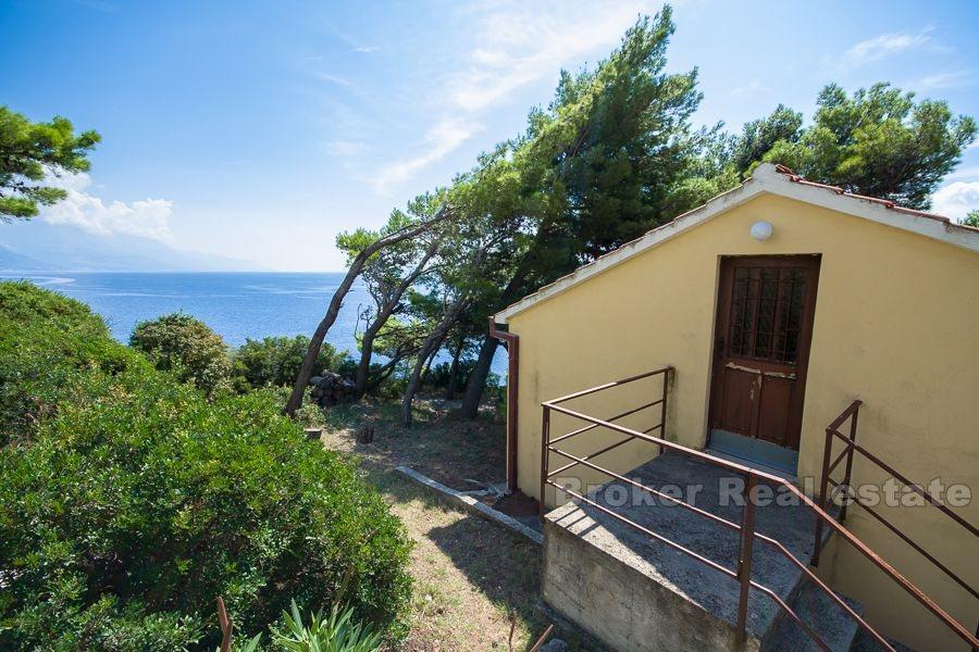 Utmärkt läge hus på första raden till havet