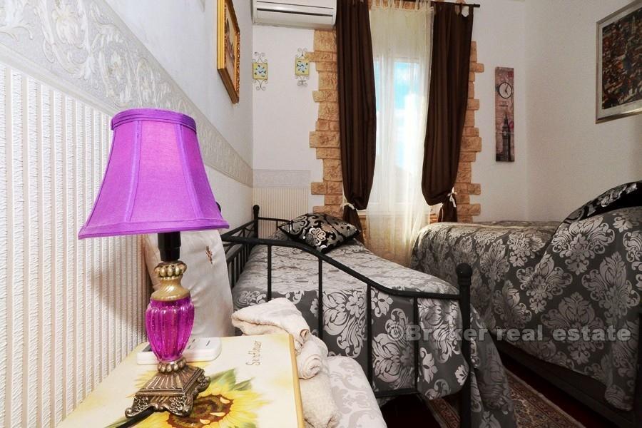 Three bedroom apartment in a stone villa, for sale