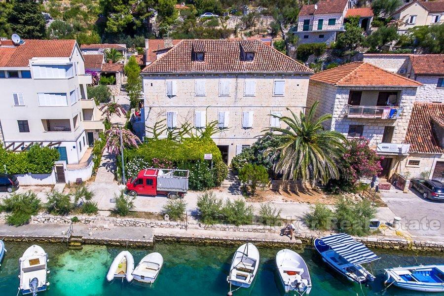 Two units in a stone house, for sale