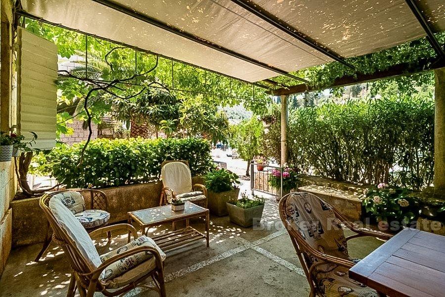 Two units in a stone house, for sale