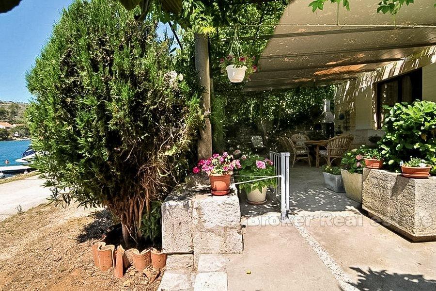Two units in a stone house, for sale