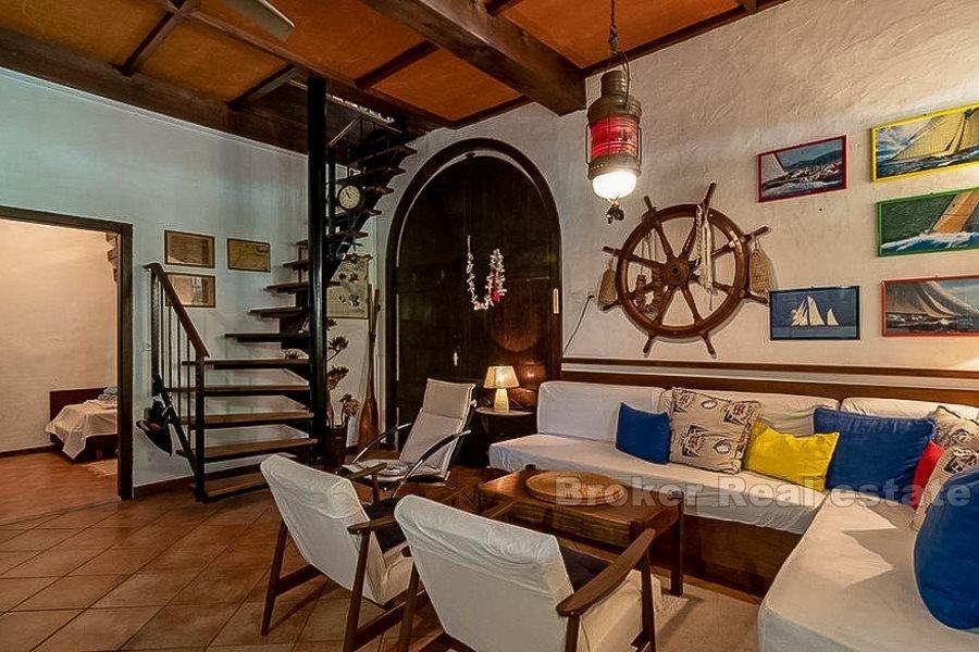 Two units in a stone house, for sale
