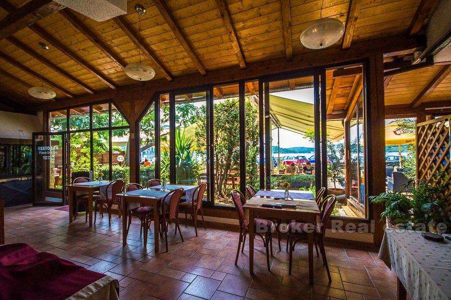 Hotel with restaurant in the first row to the sea