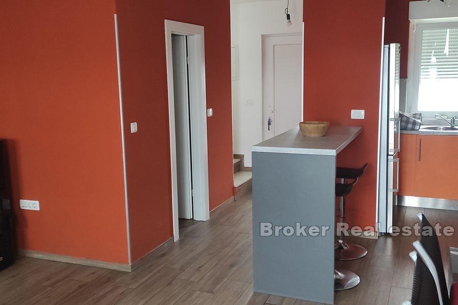 Dwupoziomowy apartament z ogrodem