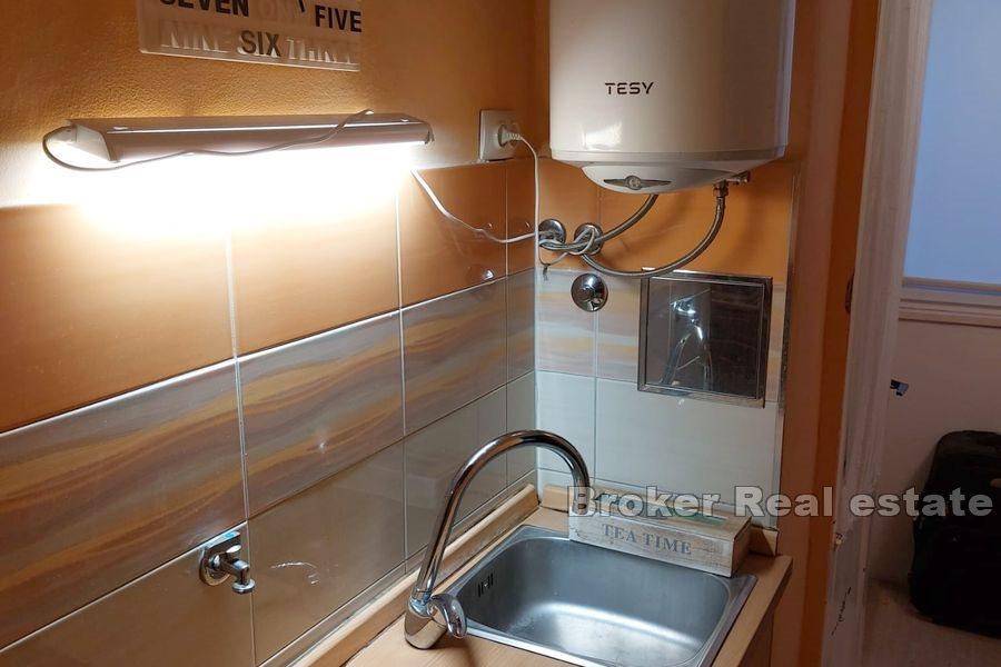 Apartment with garden in a stone house