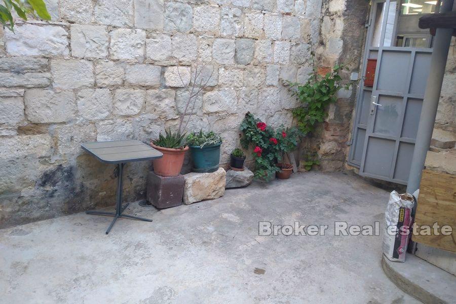 Apartment with garden in a stone house
