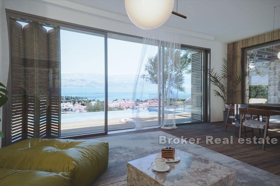 Steinvilla med basseng og havutsikt