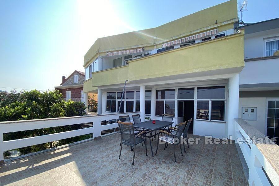 Apartment house first row to the sea