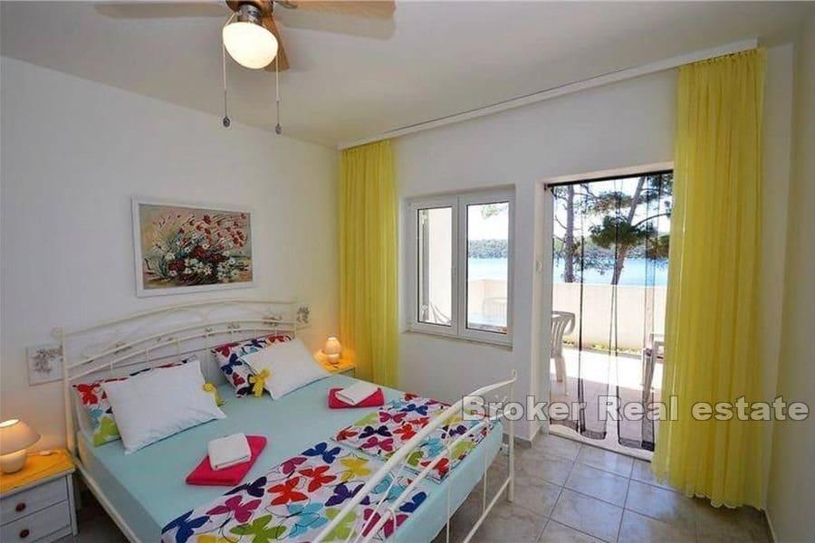 Apartment house first row to the sea