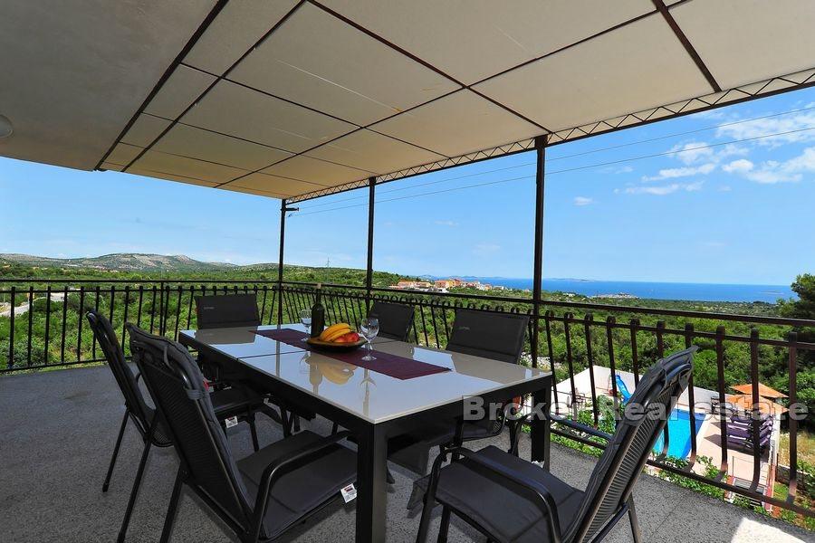 House with pool and open sea view