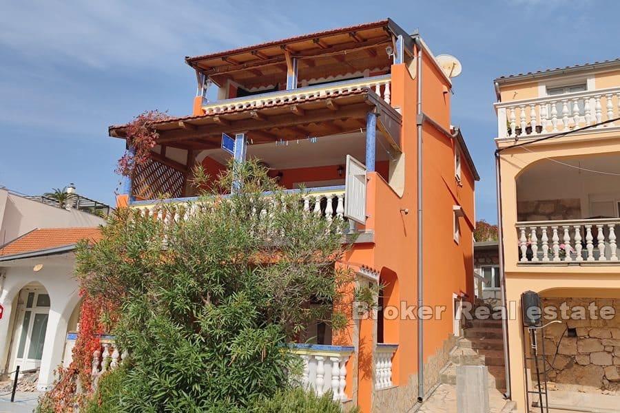 Apartment house first row to the sea