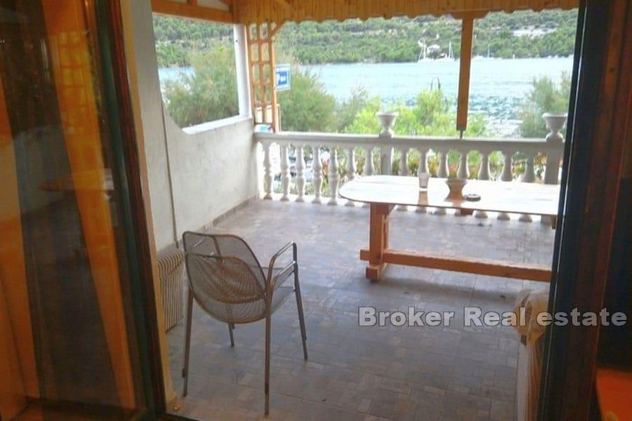 Apartment house first row to the sea