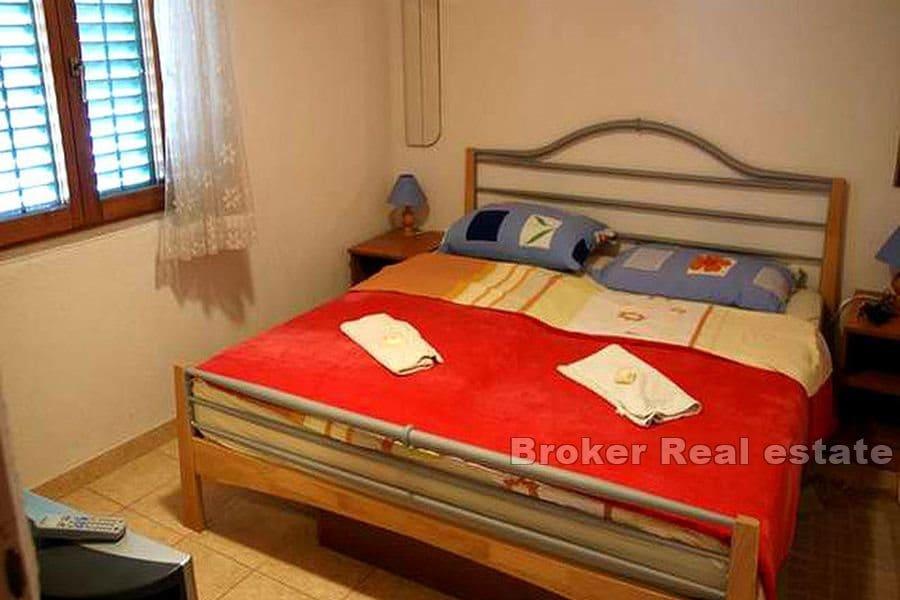 Apartment house first row to the sea