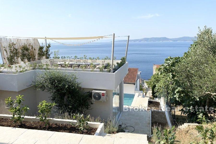 Maison avec piscine et vue dégagée sur la mer