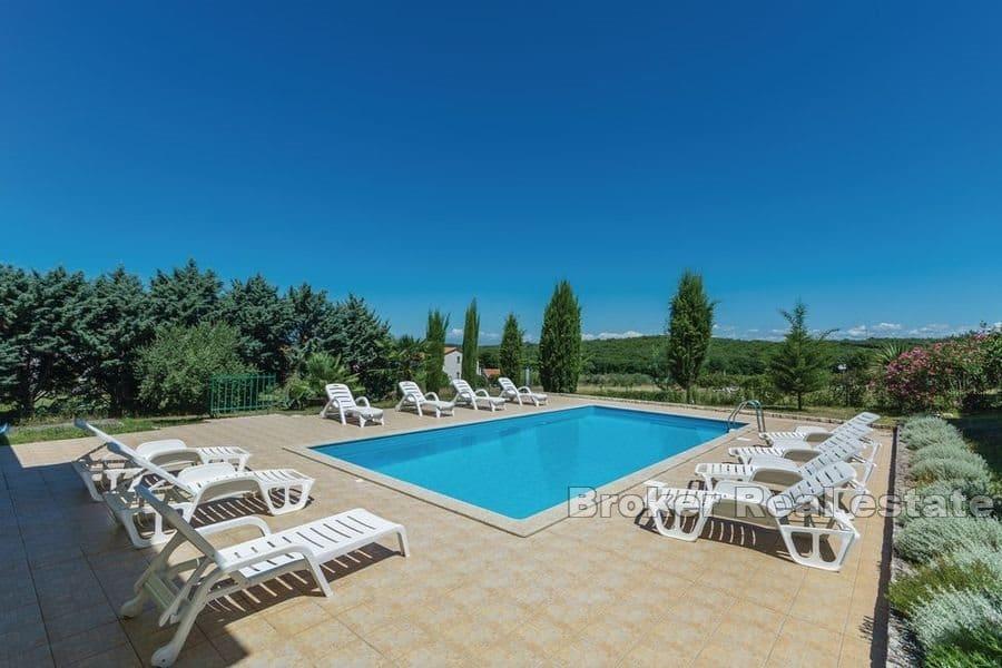 House with a pool on a spacious land