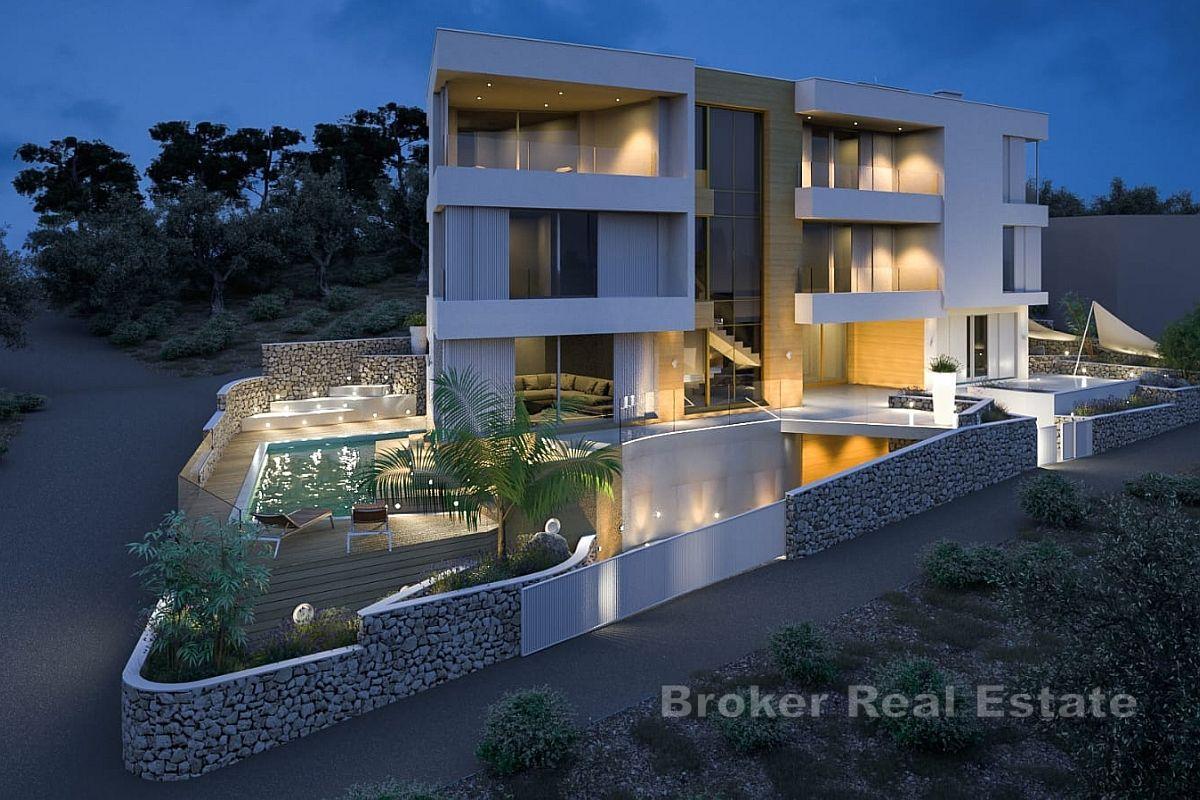 Villa in condizioni roh-bauh con tre unità abitative