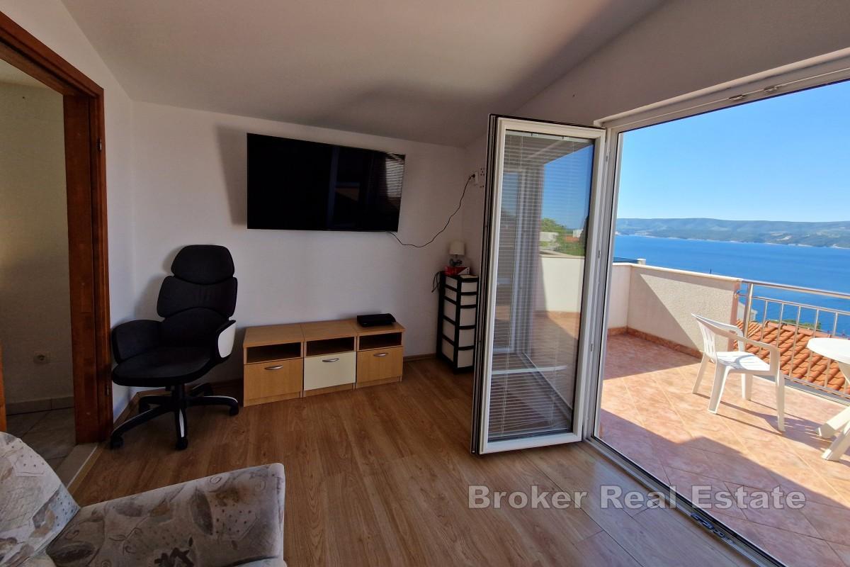 Leilighetshus med havutsikt