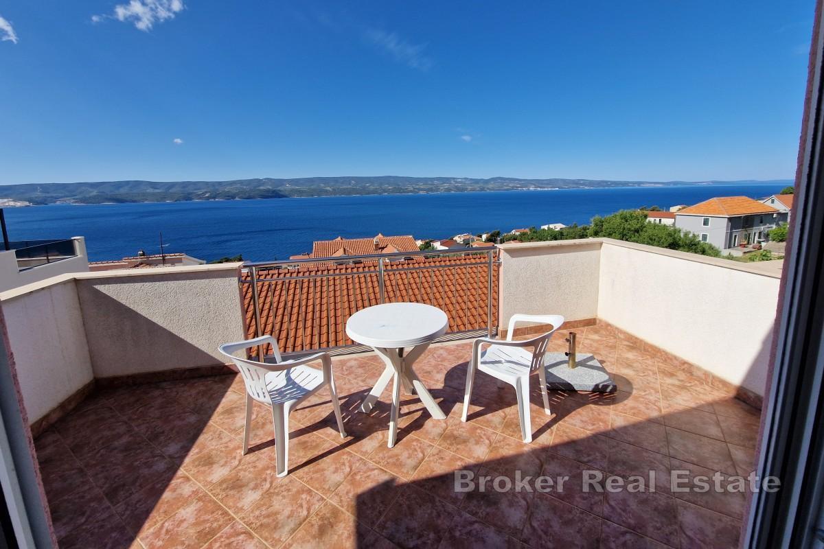 Leilighetshus med havutsikt