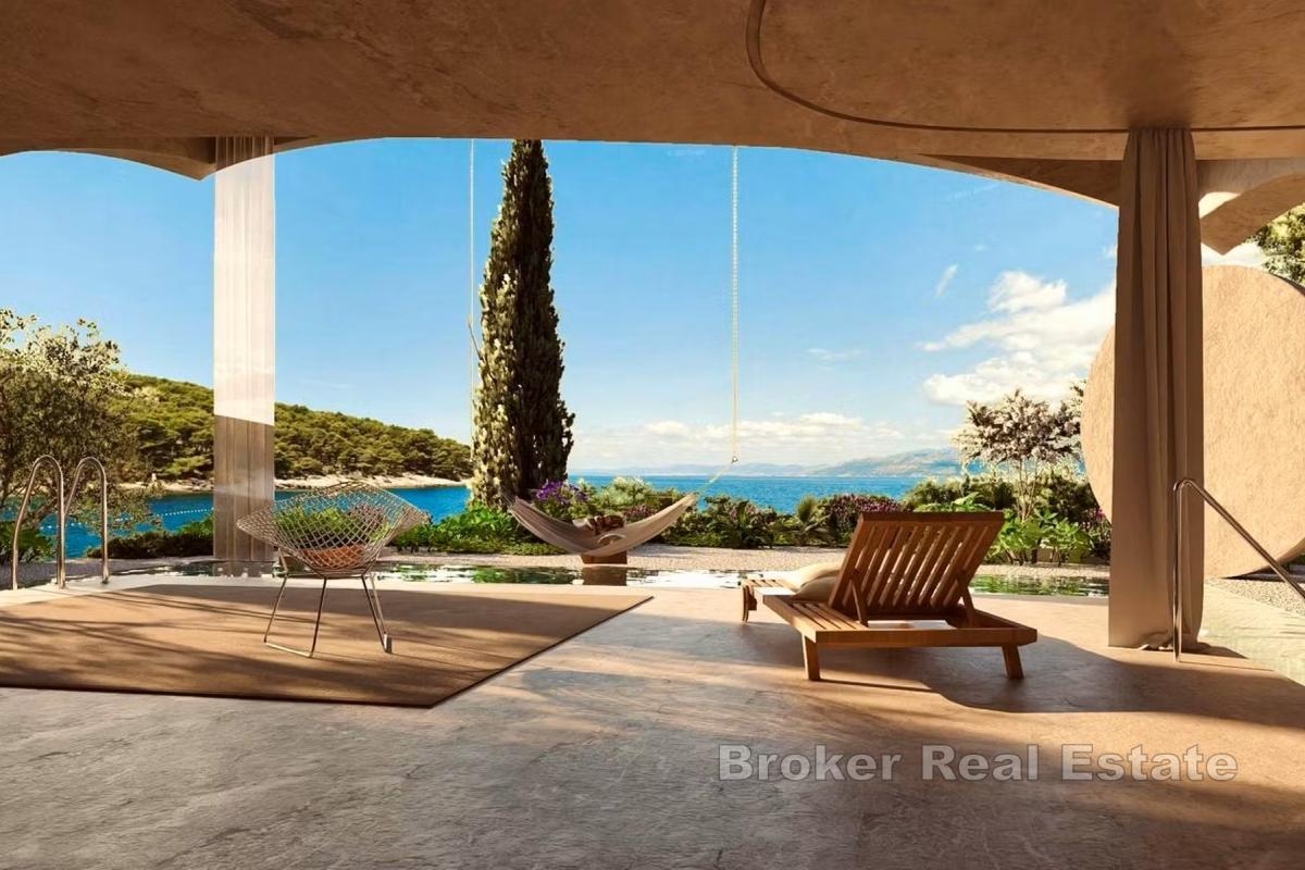 Terrain constructible avec projet de villa de luxe, en bord de mer