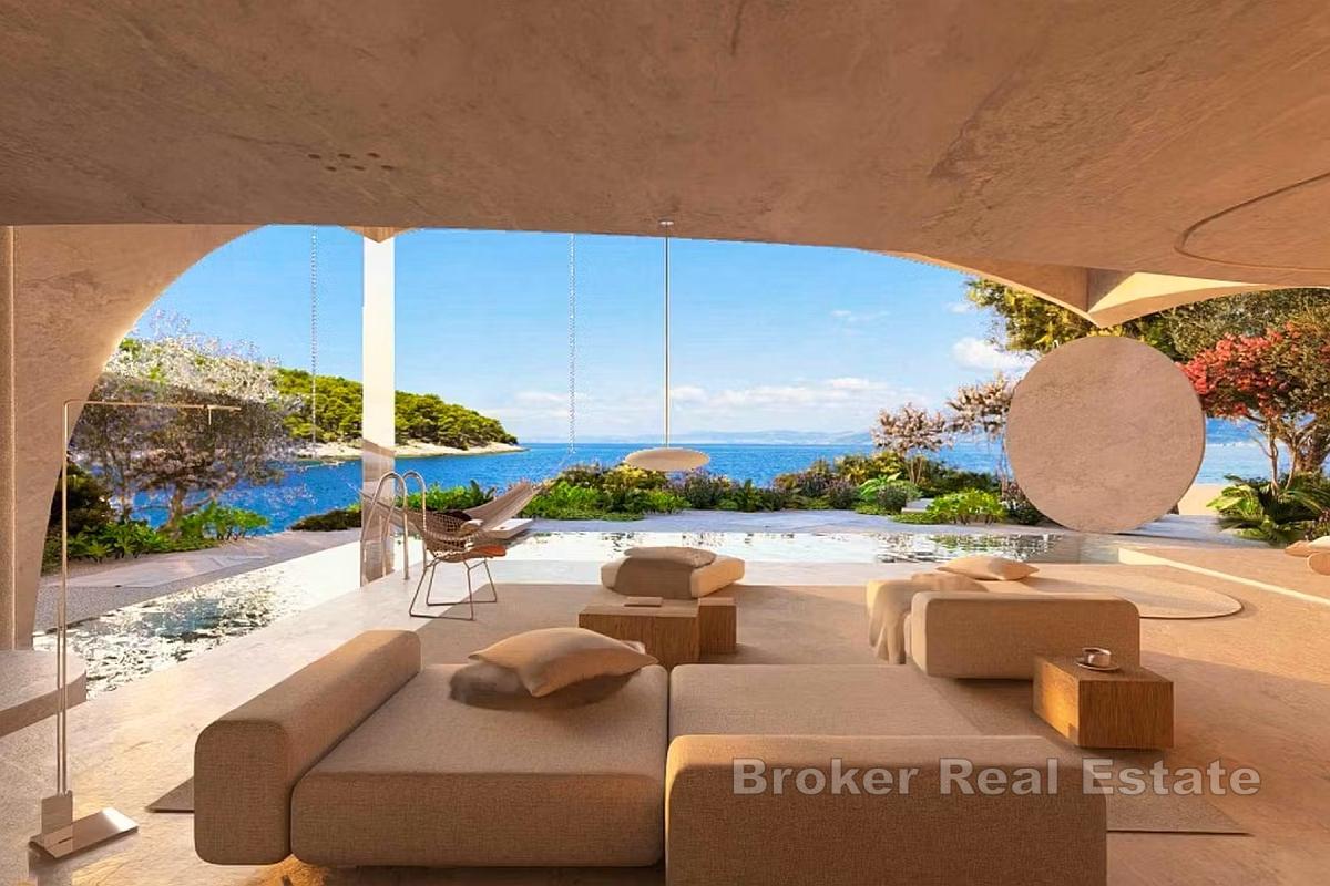 Terrain constructible avec projet de villa de luxe, en bord de mer