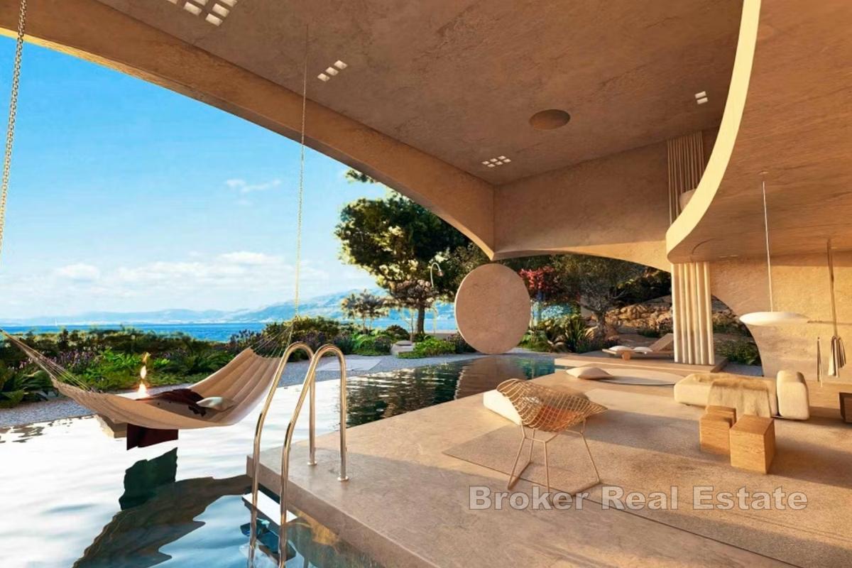 Terrain constructible avec projet de villa de luxe, en bord de mer