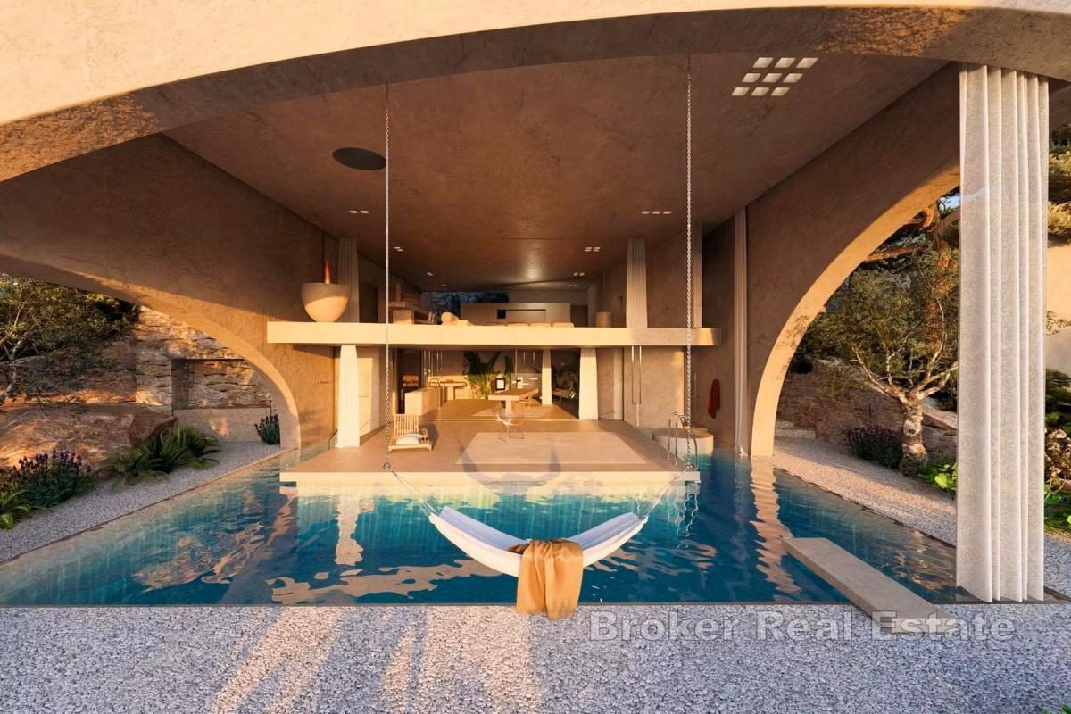 Terrain constructible avec projet de villa de luxe, en bord de mer