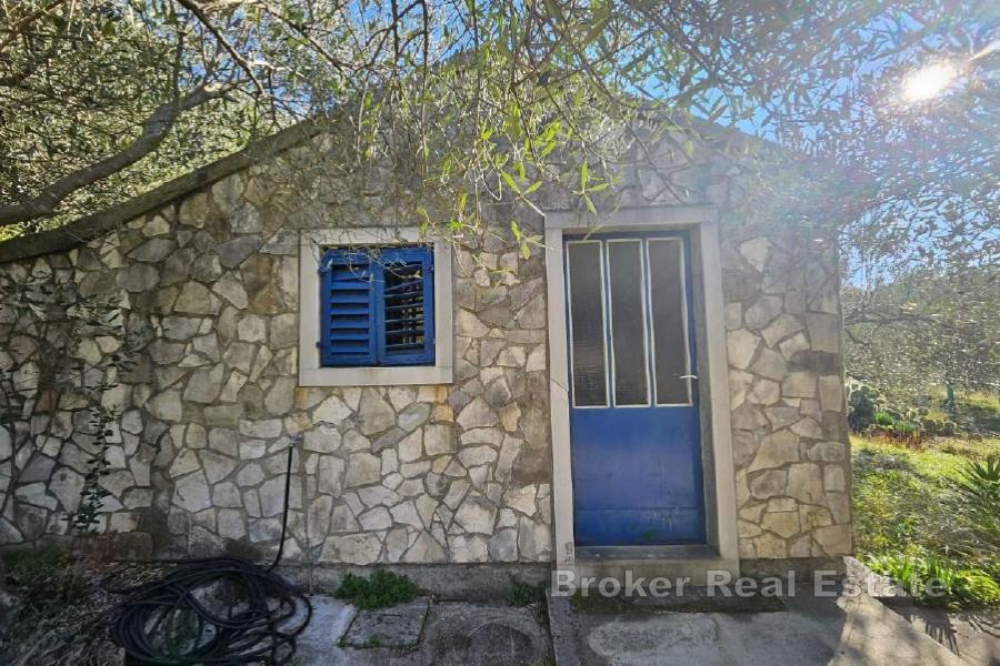 Poljoprivredno zemljište s pomoćnim objektom