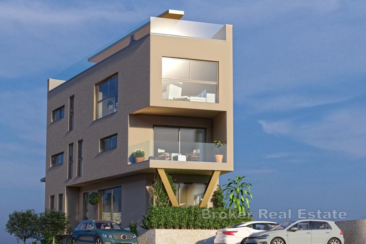 Neubau mit drei Wohnungen im Zentrum