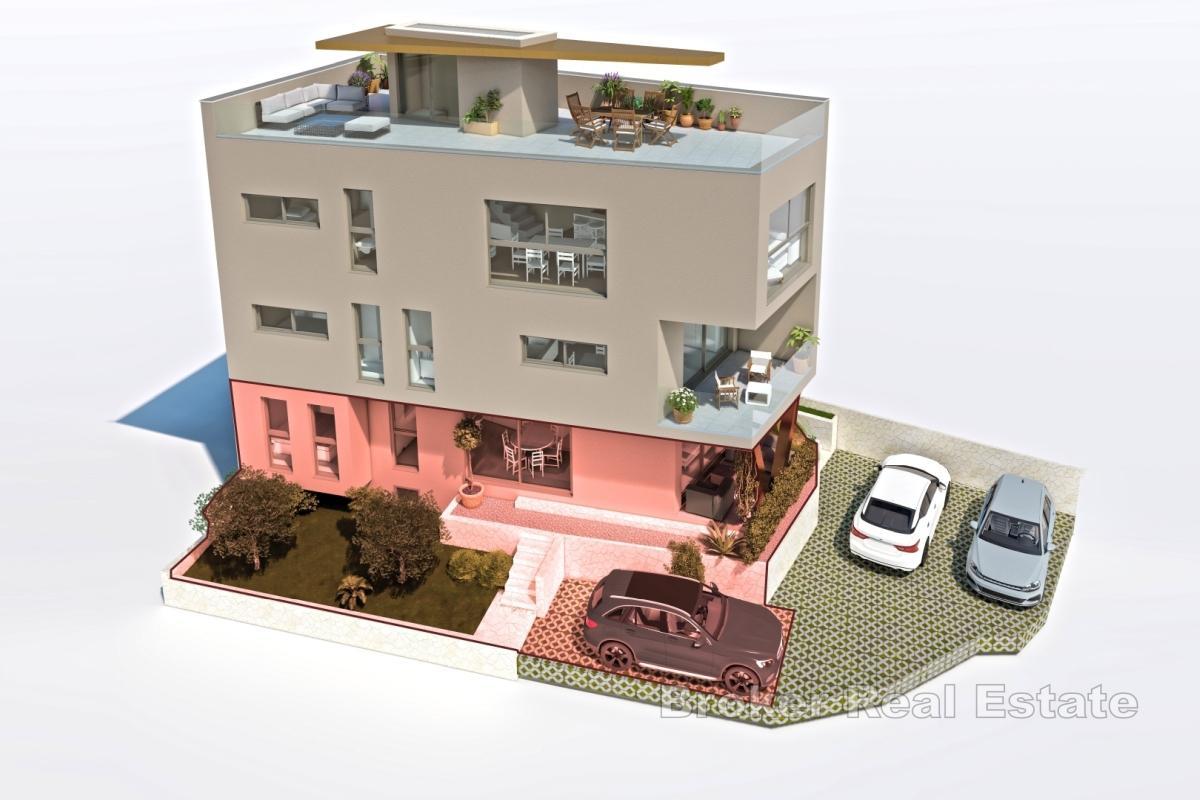 Neubau mit drei Wohnungen im Zentrum