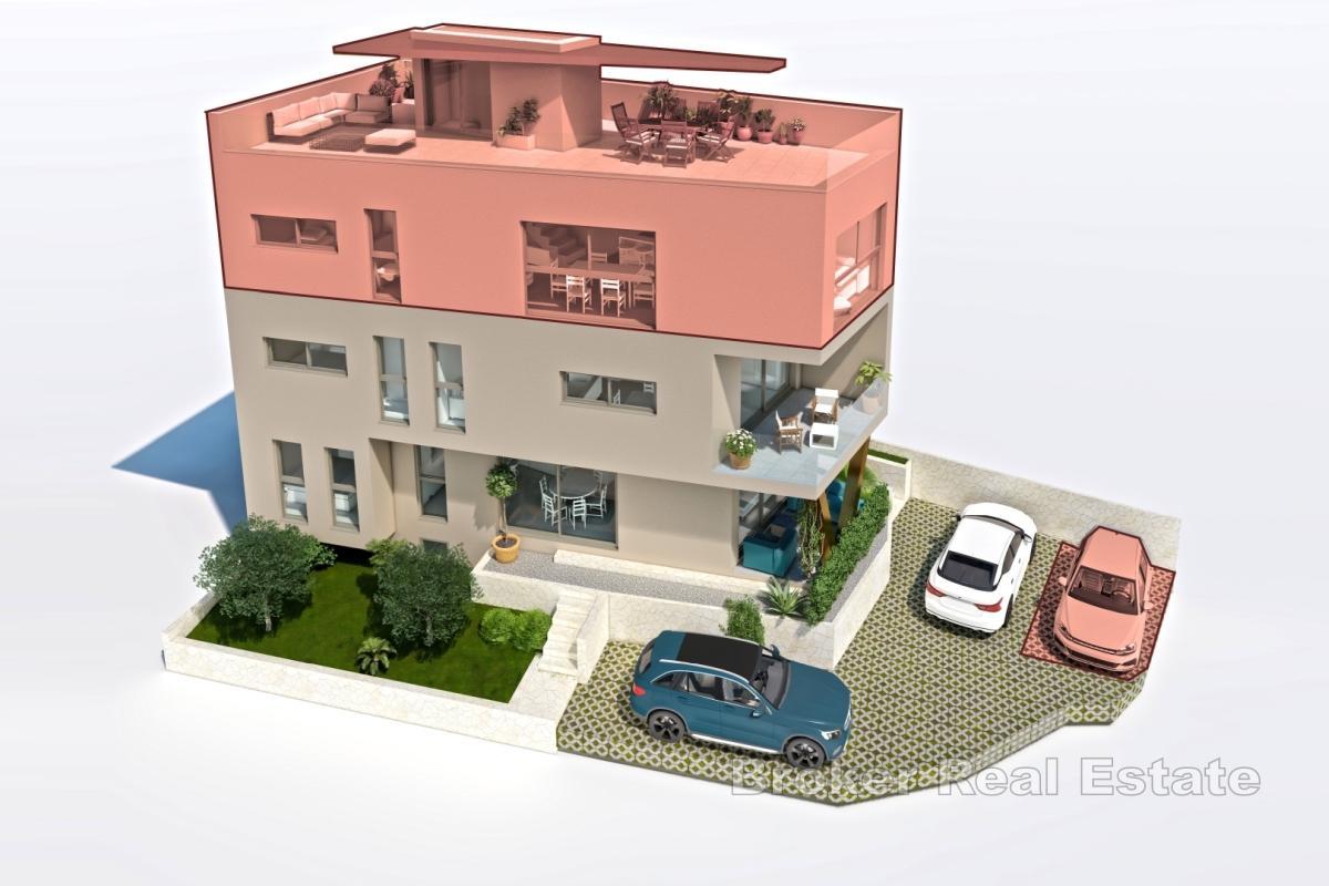 Neubau mit drei Wohnungen im Zentrum